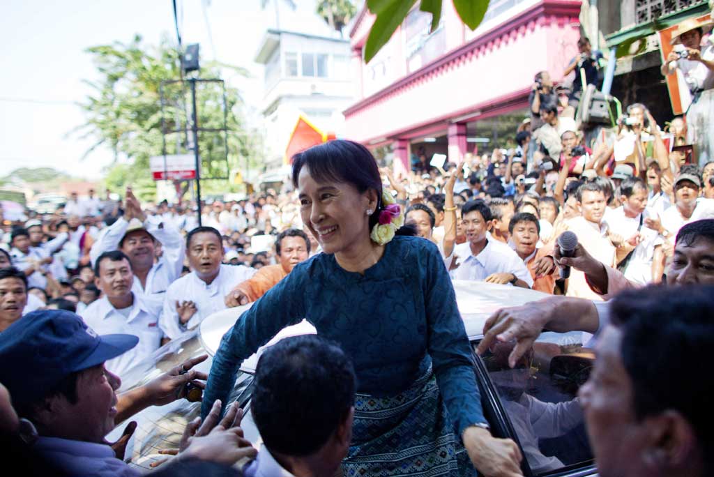 Formidable dictatorships: Burma's pro-democracy leader Aung San Suu Kyi, who endured years of house arrest, celebrates her release in November 2010