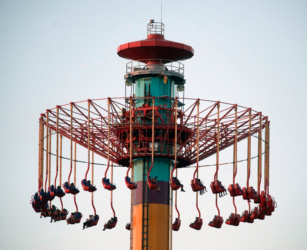 People pictured on the Windseeker ride at Knott's Berry Farm are stuck a few hundred feet off the ground.