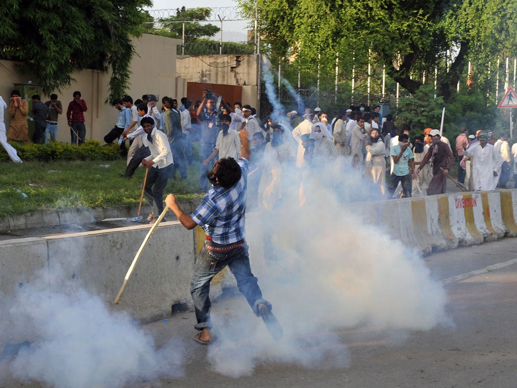 Police fire tear gas at protesters
