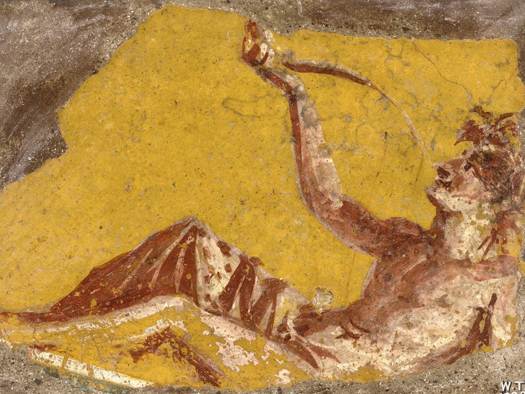 A fragment of a wall painting showing a man drinking