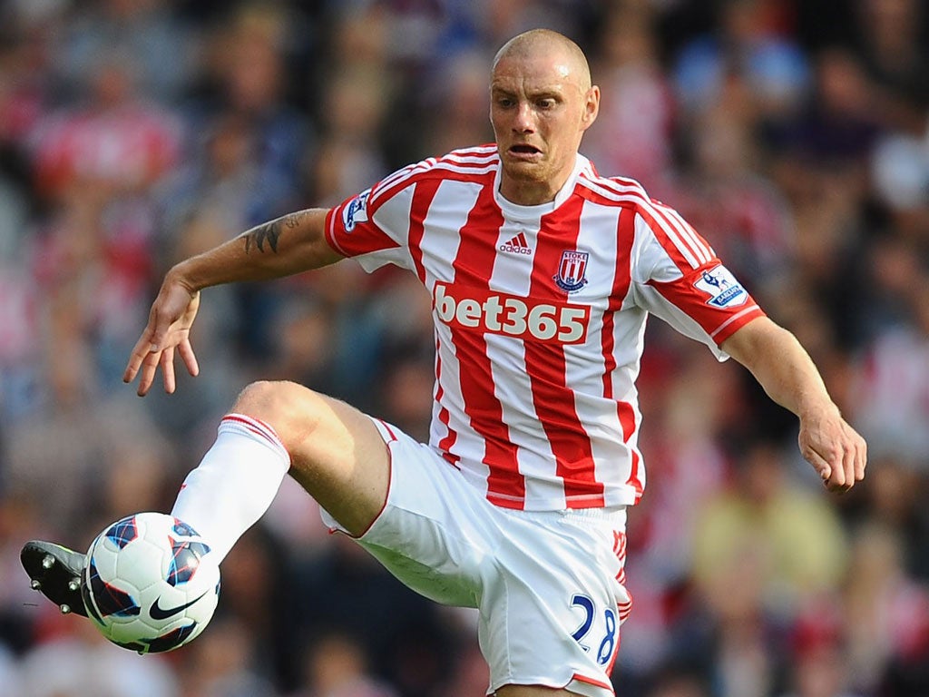 Stoke defender Andy Wilkinson will serve a three-match ban after admitting elbowing Manchester City striker Mario Balotelli in the face