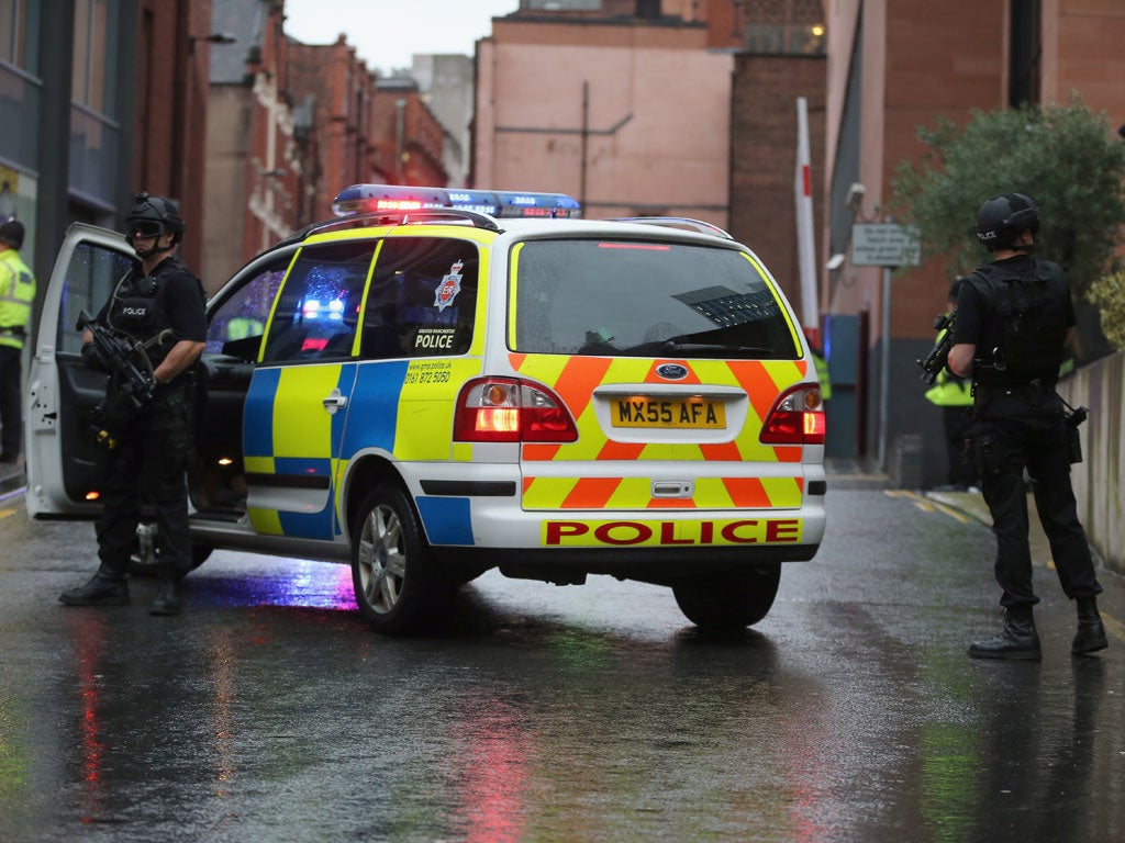 Police out in force as man accused of killing two officers appears in ...