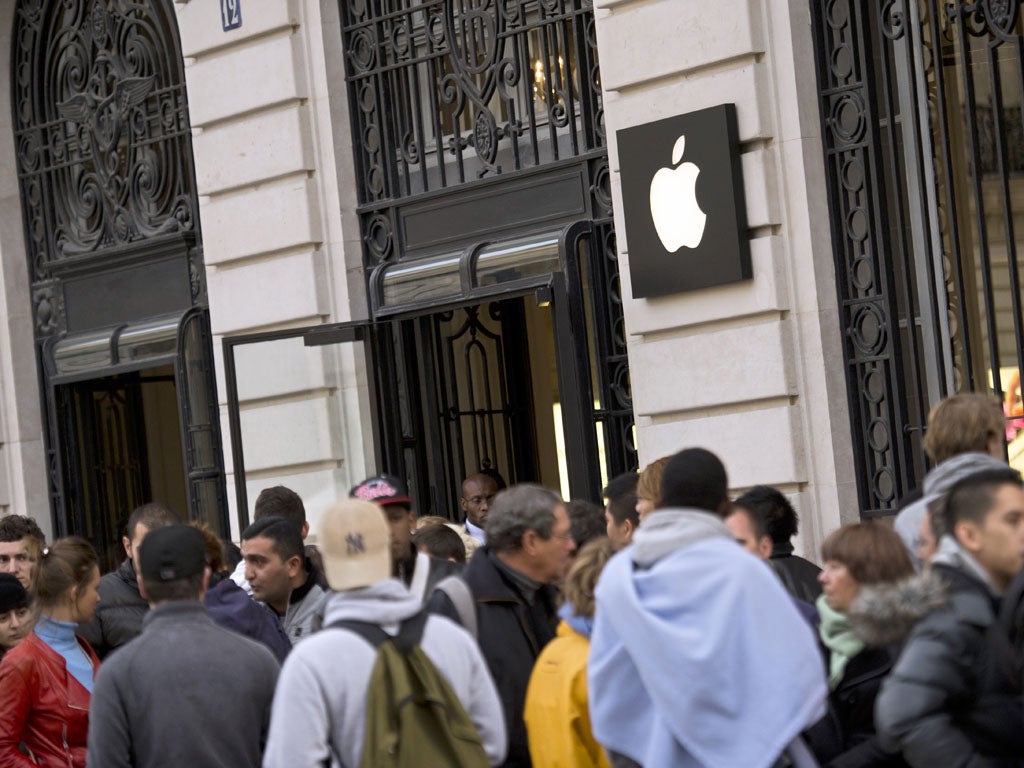 The latest Apple gadget became available from 8am, as hundreds were cheered into the brand's store in Covent Garden, central London
