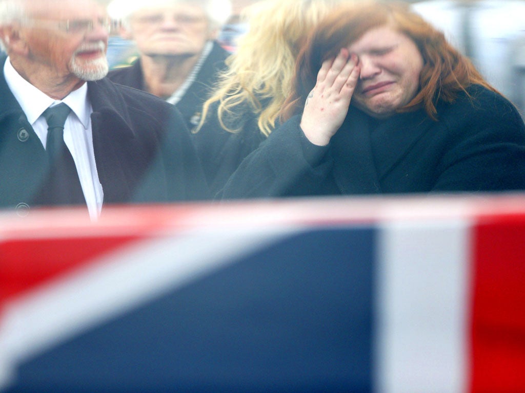 Killed in action: Mourners at the repatriation of Lance Corporal Duane Groom last week