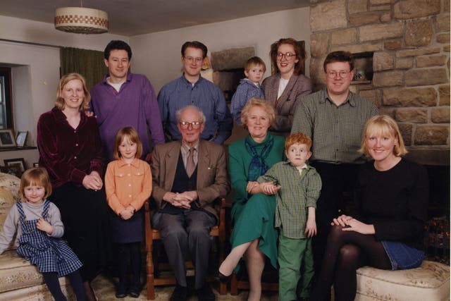 Smile, please: Joanna Moorhead, second from left, and family pose for posterity