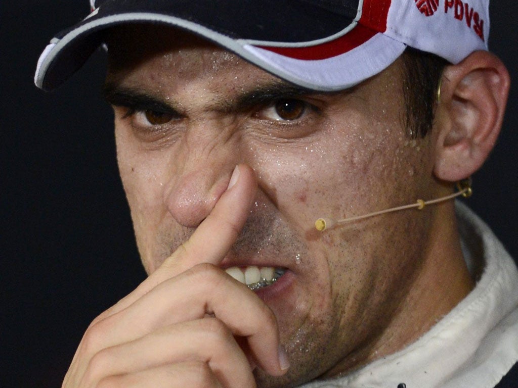 Finger on the pulse: Pastor Maldonado is on the front row in Singapore today