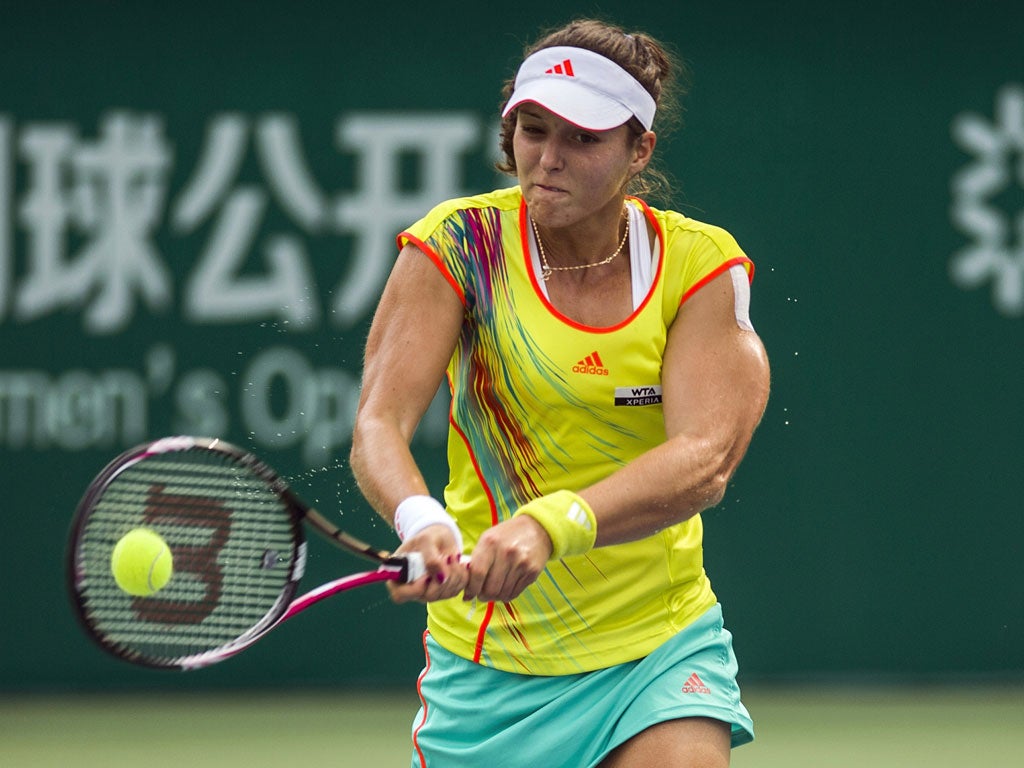 Raw power: Laura Robson fires a return in her WTA final defeat to Su-Wei Hsieh in Guangzhou