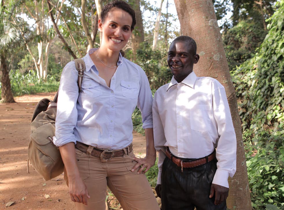 Mary-Ann Ochota, presenter, with John Ssebunya, who was cared for by monkeys as a child in Uganda, and learnt to emulate their behaviour