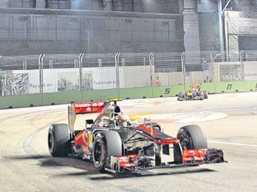 Lewis Hamilton leads the way at the Singapore Grand Prix yesterday