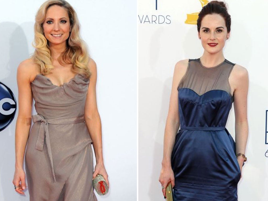 Downton Abbey actresses Joanne Froggatt and Michelle Dockery at the 64th Primetime Emmy Awards