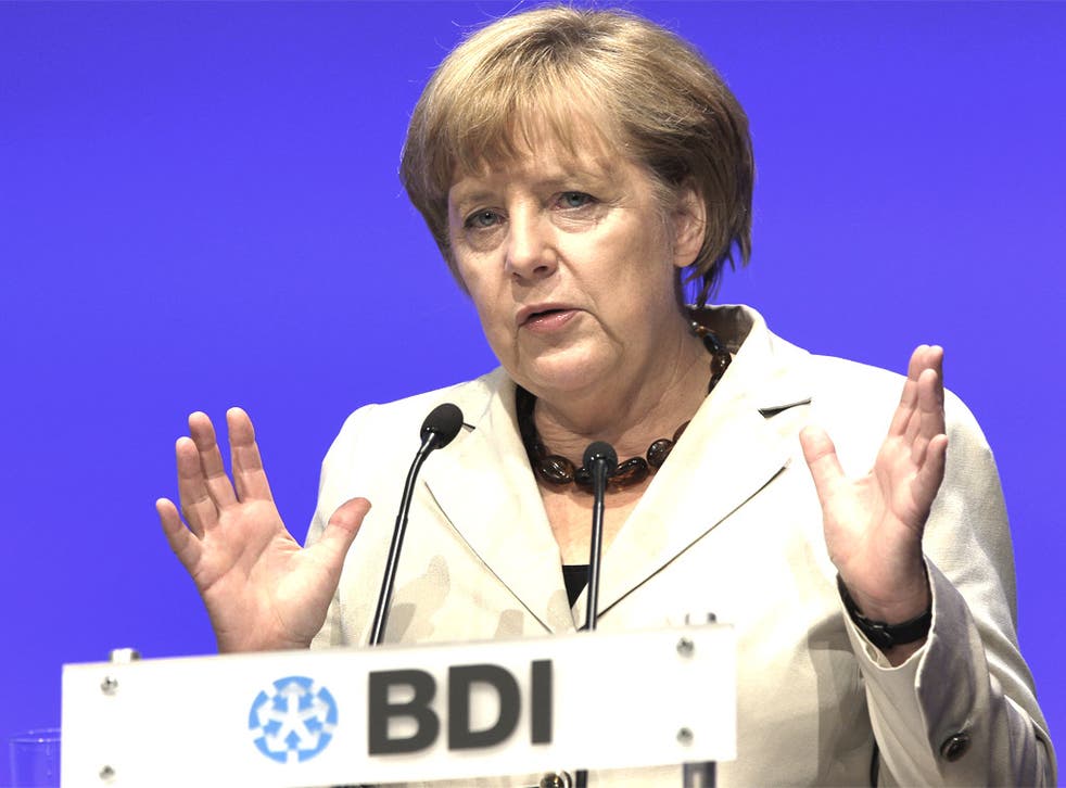Angela Merkel speaks to German business leaders in Berlin