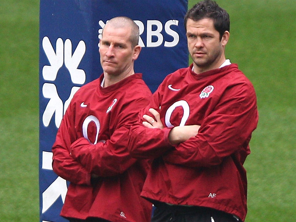 Andy Farrell (right) and Stuart Lancaster watch England training