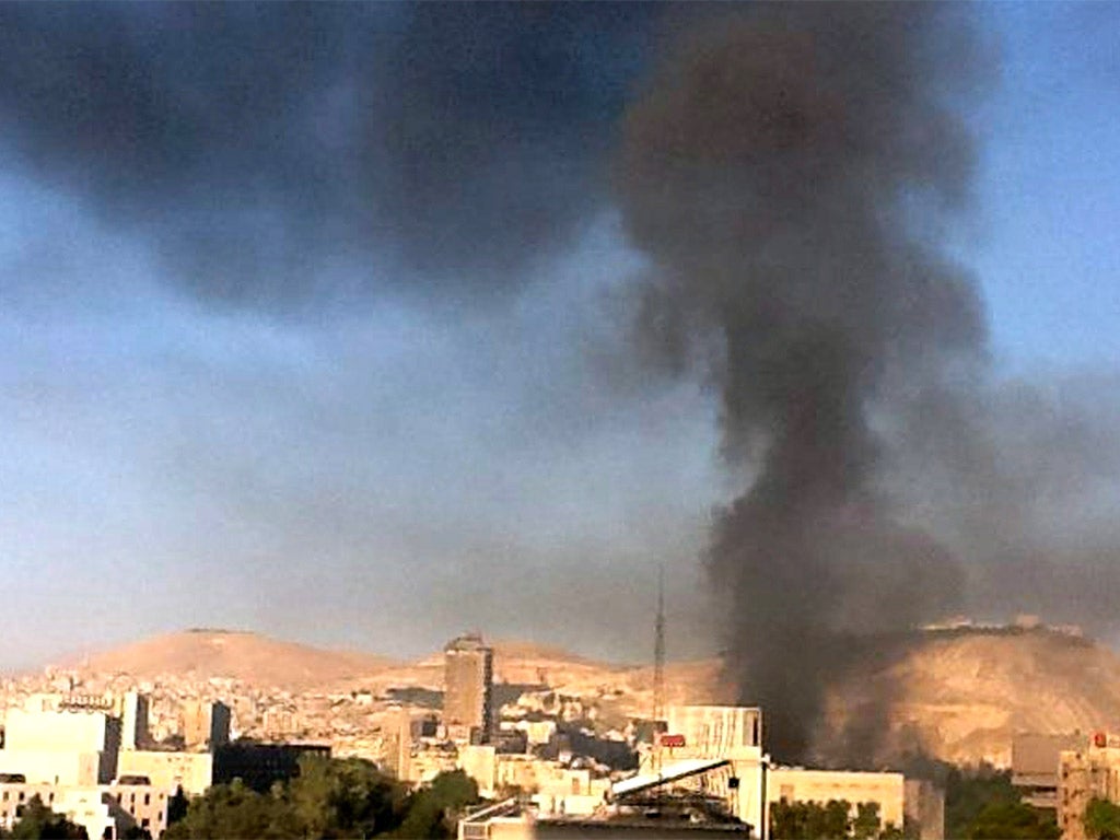 Smoke rises from the Chief of Staff’s offices in Damascus
