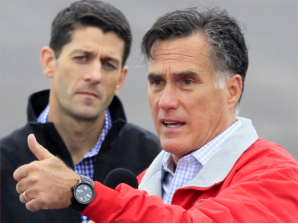 Mitt Romney with his running mate Paul Ryan
