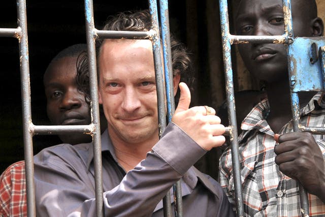 David Cecil in a Kampala court cell after his arrest earlier this month