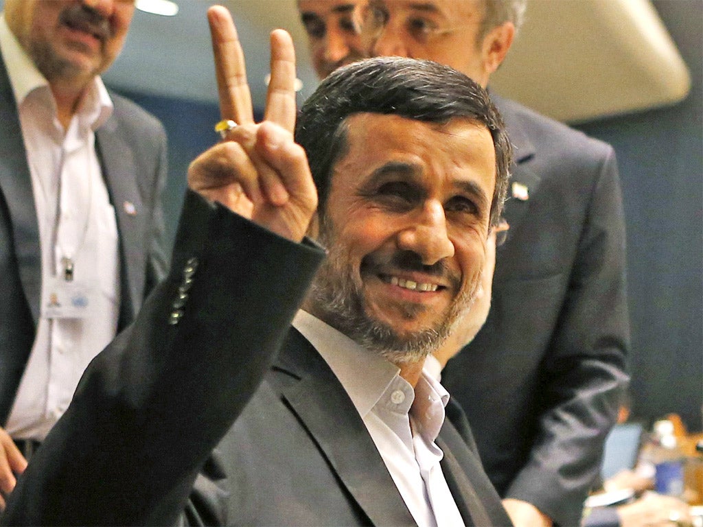 Mahmoud Ahmadinejad gestures prior to his address, in which he called for a new world order