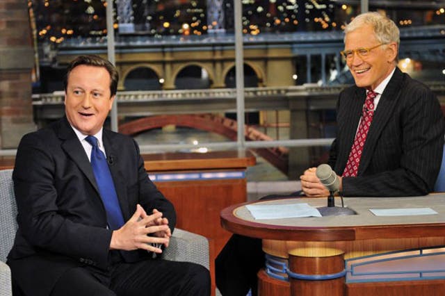 David Cameron was welcomed on to the Late Show by host David Letterman to the tune of the house band playing Rule Britannia and dry ice pumping into the studio to replicate a London fog