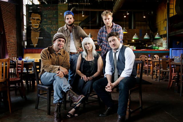 Emmylou Harris (centre) with Mumford & Sons
