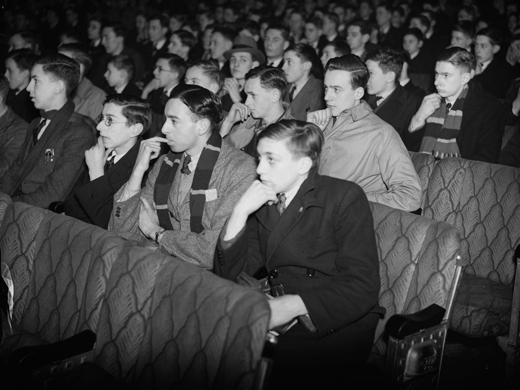 16th March 1936: Schoolboys from several schools, including Westminster School, watching the H G Wells film 'Things To Come'.