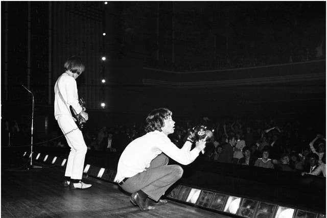 Brian Jones and Mick Jagger performing at the Adelphi Theatre, Dublin, during the band's second Irish tour of 1965.