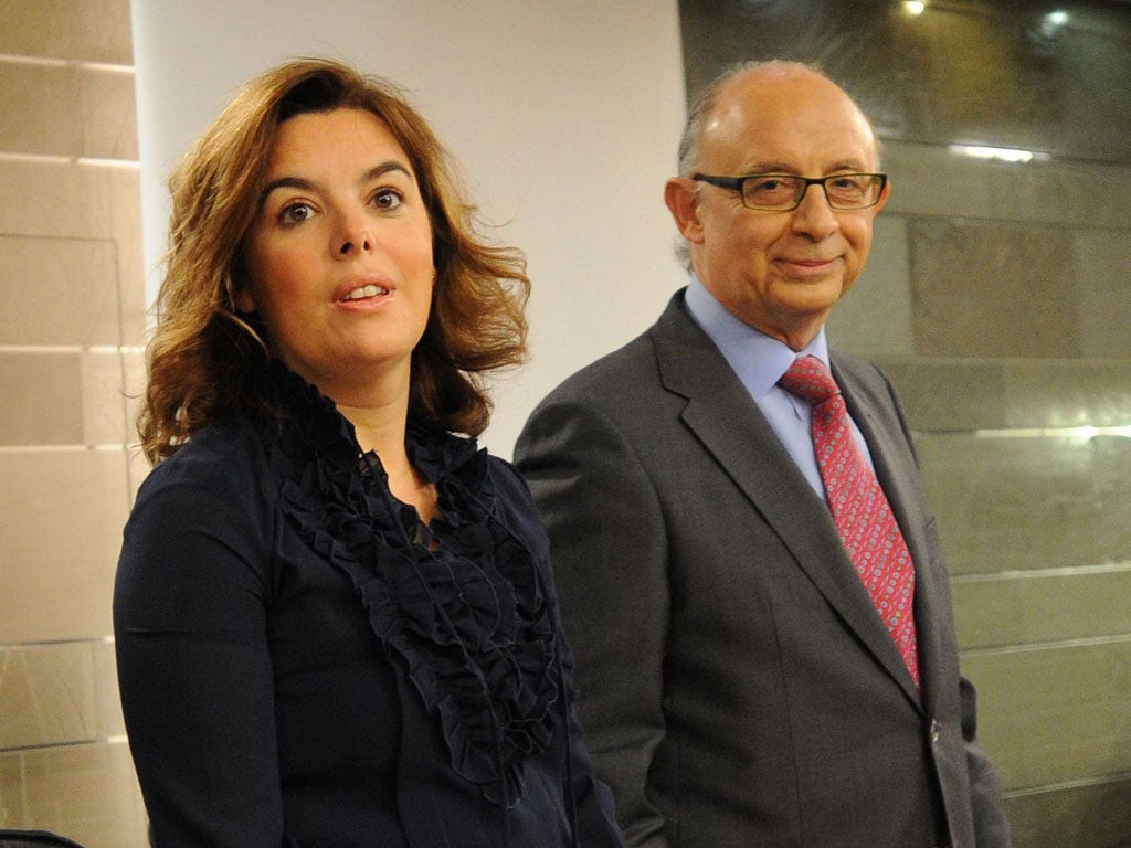 Spain’'s Deputy PM, Soraya Saenz de Santamaria, and the Treasury minister Cristobal Romero present the budget yesterday
