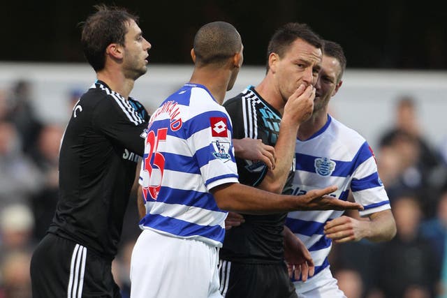 John Terry covers his mouth after his flashpoint with Anton Ferdinand