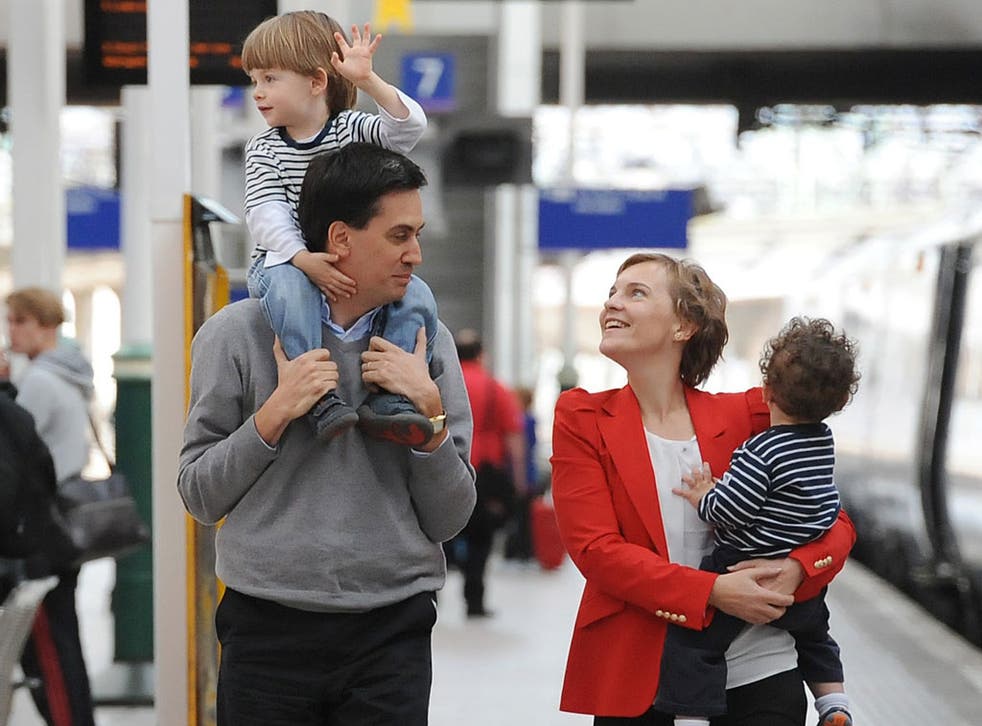 Family united: Ed Miliband and his wife, Justine, arrive with sons Daniel, 3, and Samuel, 4