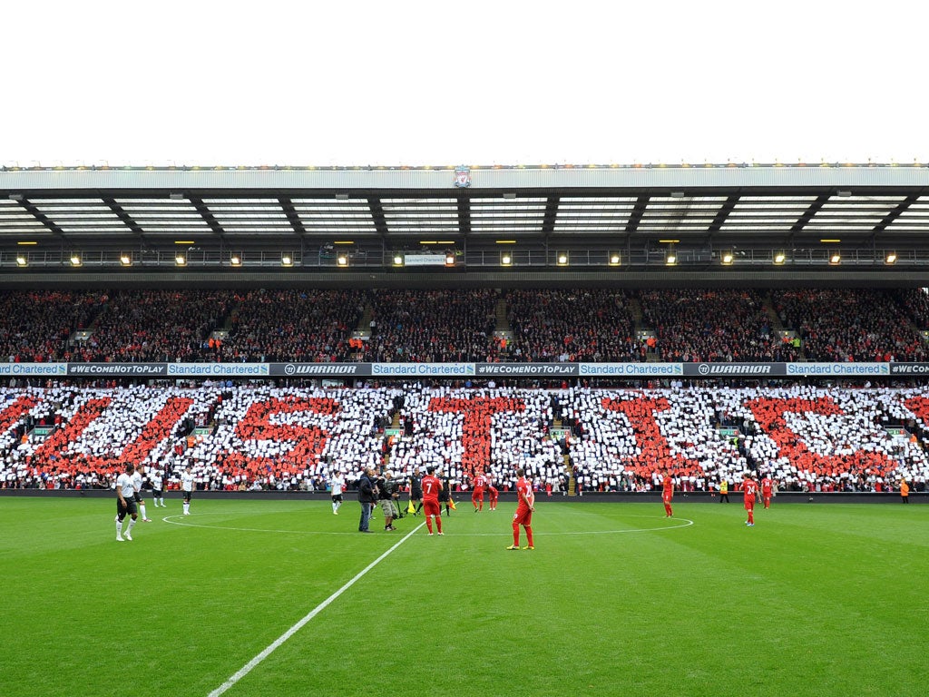 Pitch protest: The scene last Sunday at Anfield as mosaics are formed by Liverpool fans spelling out 'The Truth', '96' and 'Justice' at the Premier League match with Manchester United