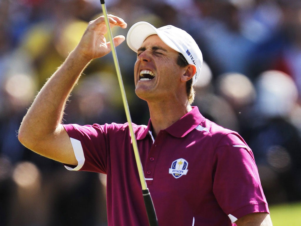 Join the club: Nicolas Colsaerts is frustrated as he misses a putt on the 15th hole playing with Sergio Garcia yesterday