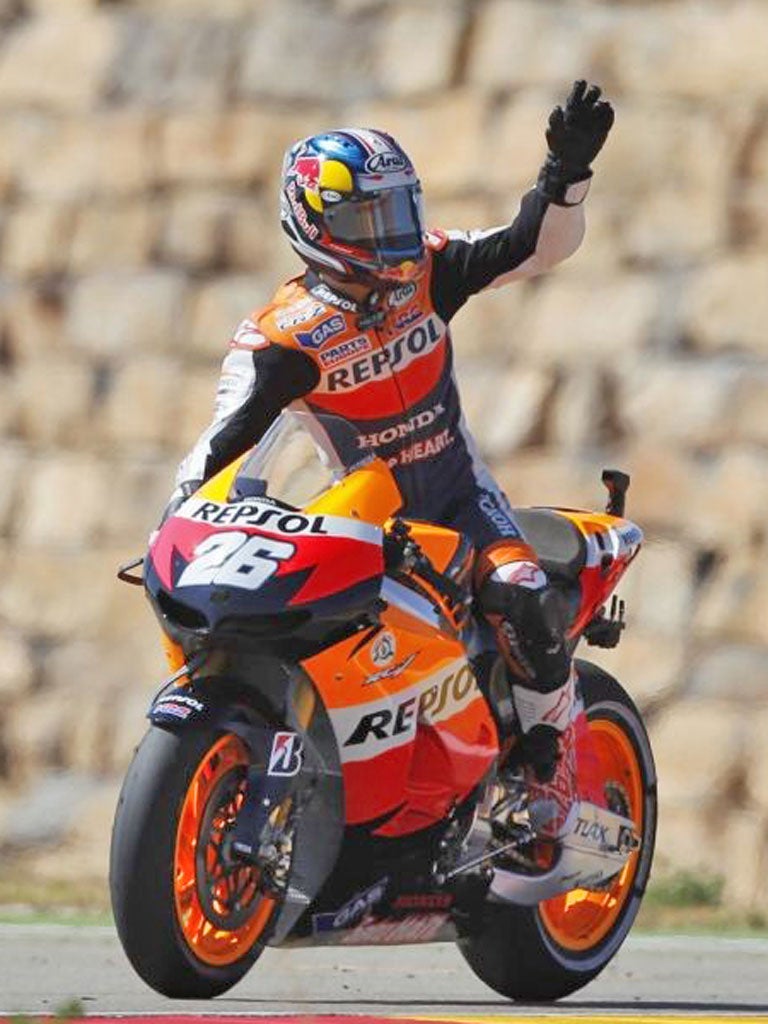 Dani Pedrosa salutes the fans after his Aragon victory