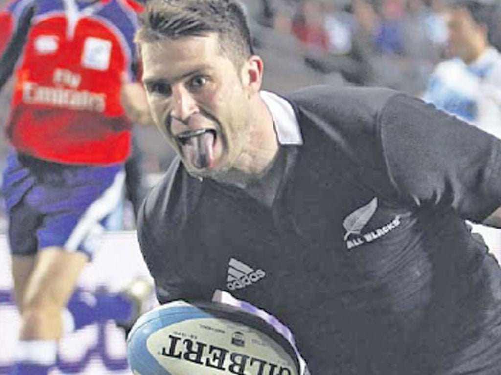 Cory Jane scores one of his three tries for New Zealand