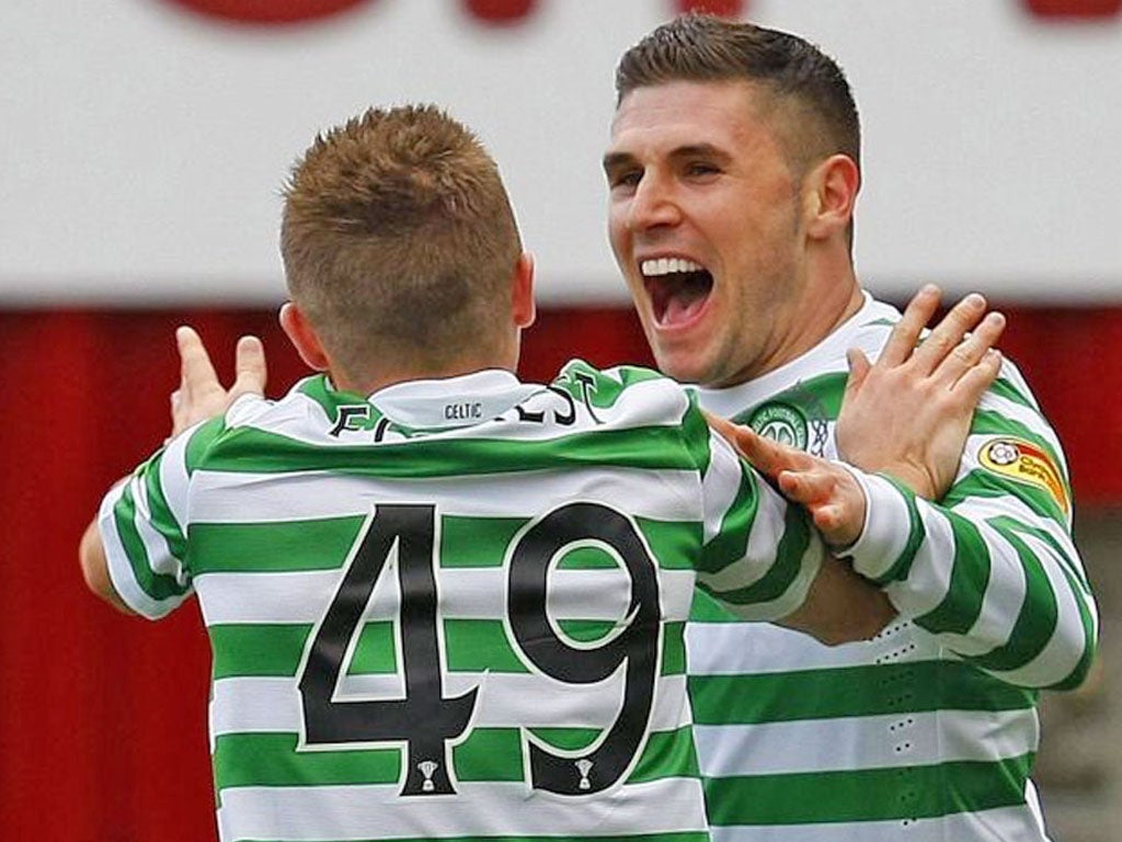 Gary Hooper (right) celebrates with team-mate James Forrest after scoring Celtic’s opener