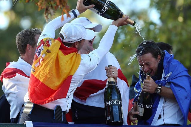Sergio Garcia, Luke Donald, Nicolas Colsaerts and Graeme McDowell of Europe celebrate after helping their team defeat the United States