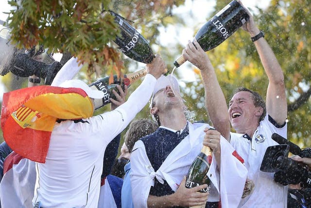 Justin Rose glugs the traditional post-game triple magnum of champagne