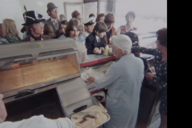 A still taken from long-forgotten footage of The Beatles visiting a chip shop in Somerset as they filmed their surreal road movie Magical Mystery Tour
