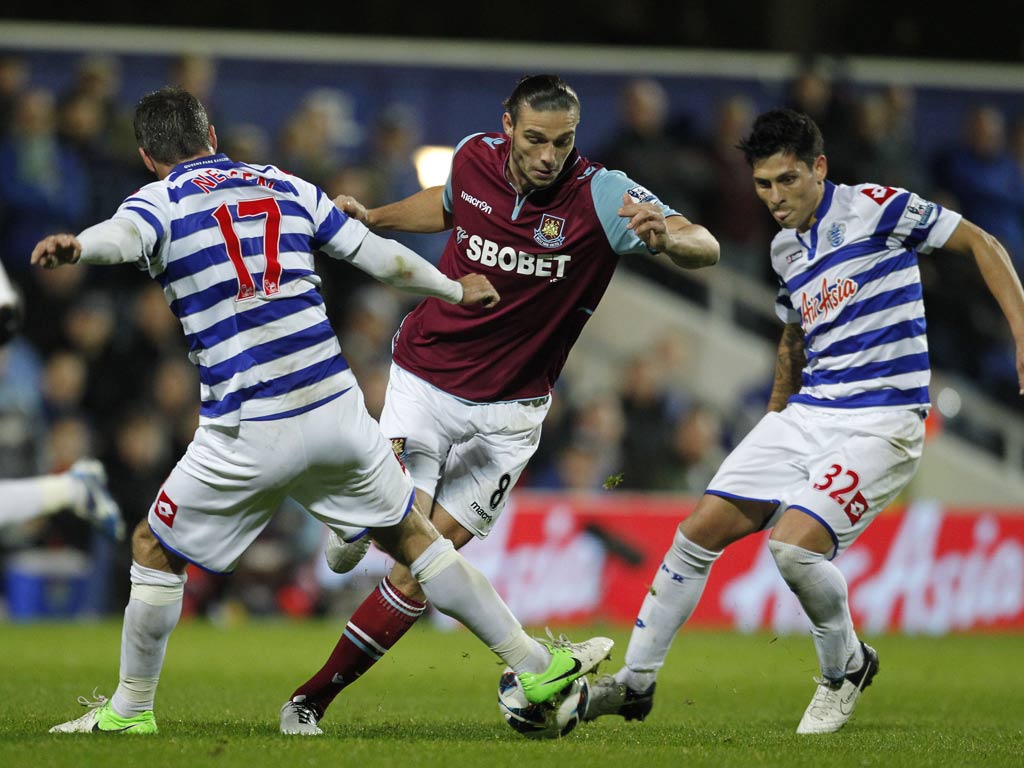 Andy Carroll in action against QPR