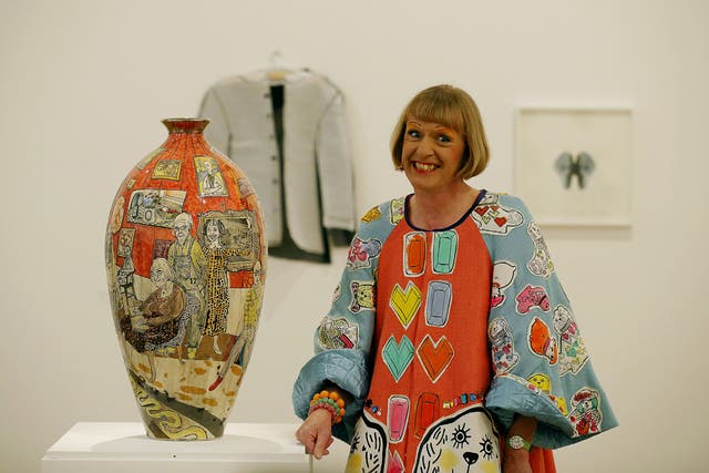 Artist Grayson Perry with "Bad Portraits of Establishment Figures" in the  'RA Now' exhibition