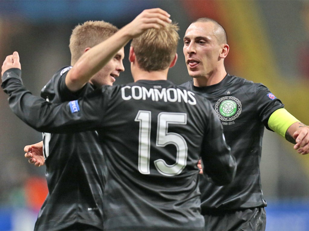 Celtic players celebrate a historic victory in Moscow