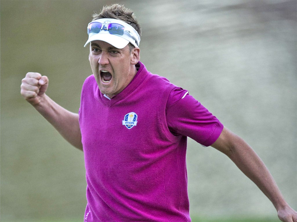 Ian Poulter roars after sinking his putt on the 18th on Saturday