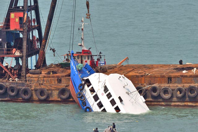 The Lamma IV is held in place by a salvage operation