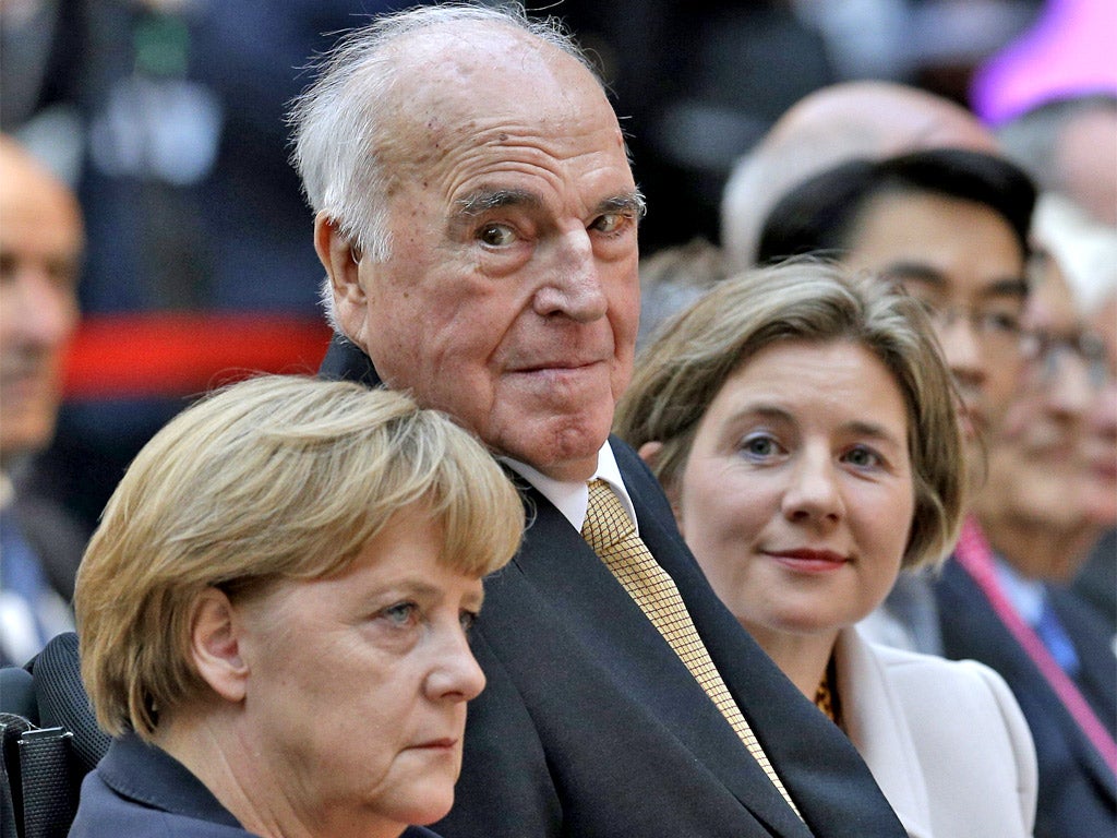 Helmut Kohl with his new wife Maike, and Angela Merkel at a reception in his honour