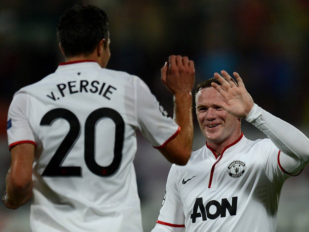 Wayne Rooney provided both assists for Robin van Persie in the Champions League match against Cluj