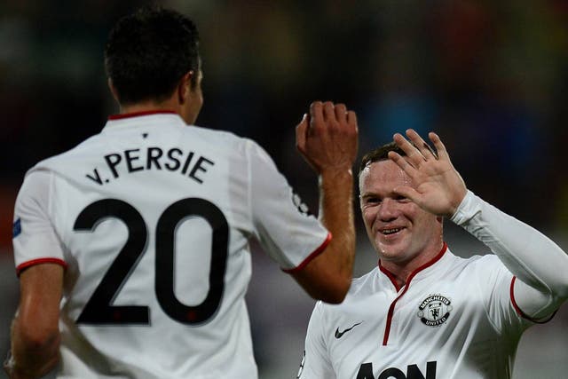 Wayne Rooney provided both assists for Robin van Persie in the Champions League match against Cluj