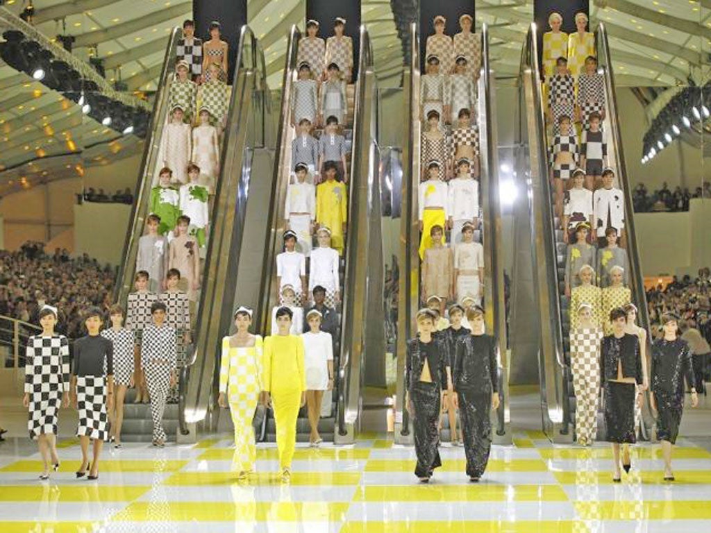 Models wear creations for Louis Vuitton's' ready to wear Spring/Summer 2013 collection, presented in Paris yesterday