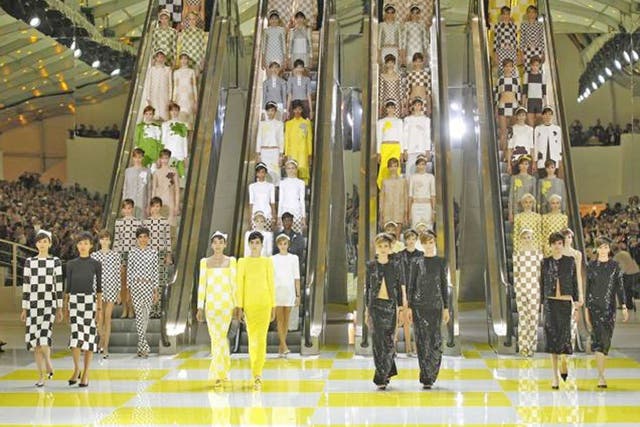 Models wear creations for Louis Vuitton's' ready to wear Spring/Summer 2013 collection, presented in Paris yesterday