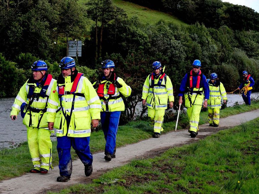 A rescue team search for missing girl April Jones near Machynlleth