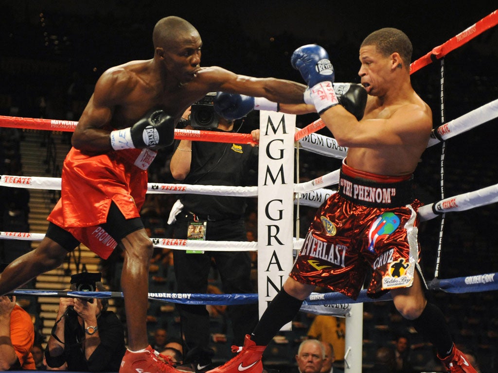 Featherweight Orlando Cruz, right, fights American Cornelius Lock in Las Vegas in 2009