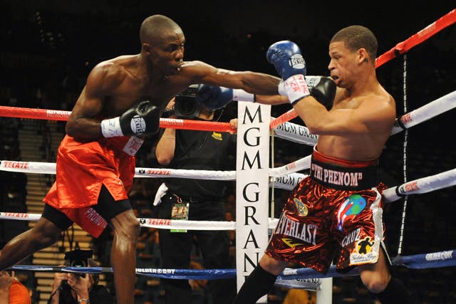Featherweight Orlando Cruz, right, fights American Cornelius Lock in Las Vegas in 2009