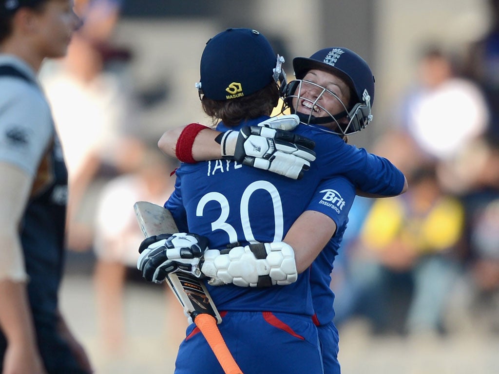 Sarah Taylor and Arran Brindle celebrate their win over New Zealand