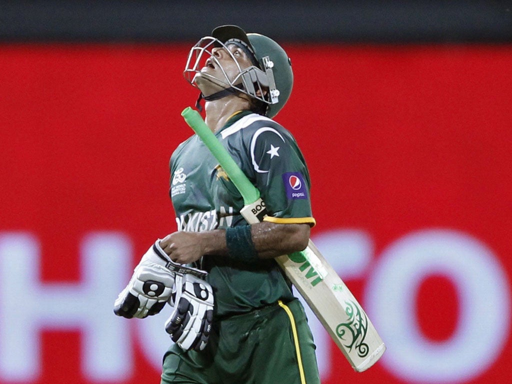 Pakistan captain Mohammed Hafeez heads to the pavilion